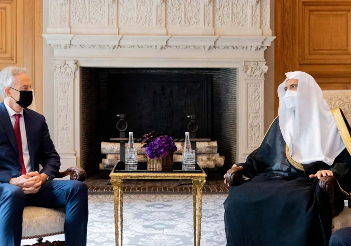 His Excellency Sheikh Dr. Mohammed bin Abdulkarim Al-Issa meets with the British Prime Minister, Mr. Tony Blair