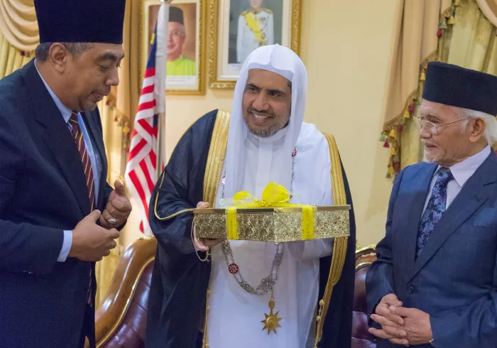 His Excellency Sheikh Dr. Mohammed bin Abdul Karim Al-Issa during a ceremony in which he received the Dato' Sari, the State Medal of the highest degree from His Majesty the Sultan of Malaysia